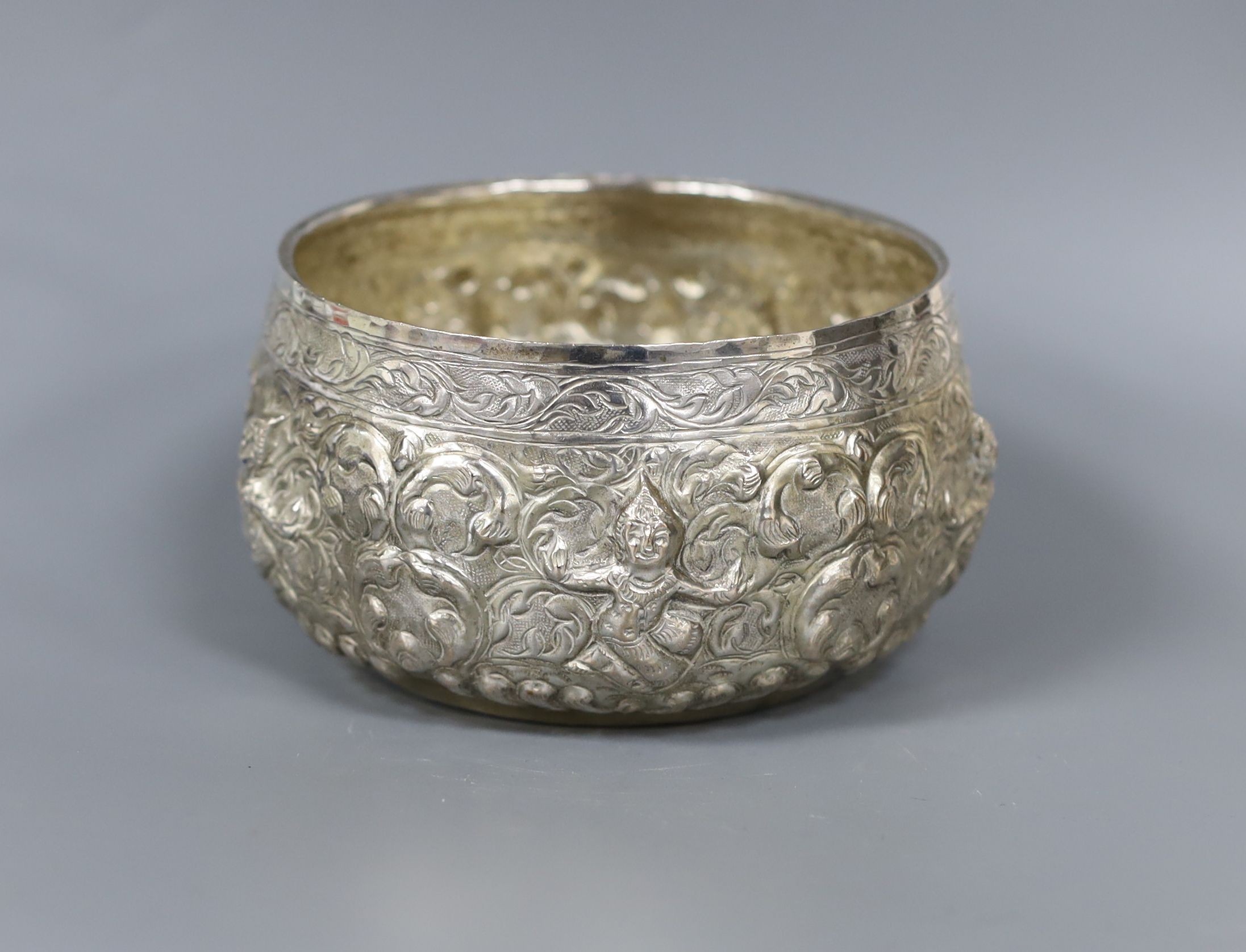 An Indian embossed white metal bowl, diameter 11.2cm, 4.5oz.